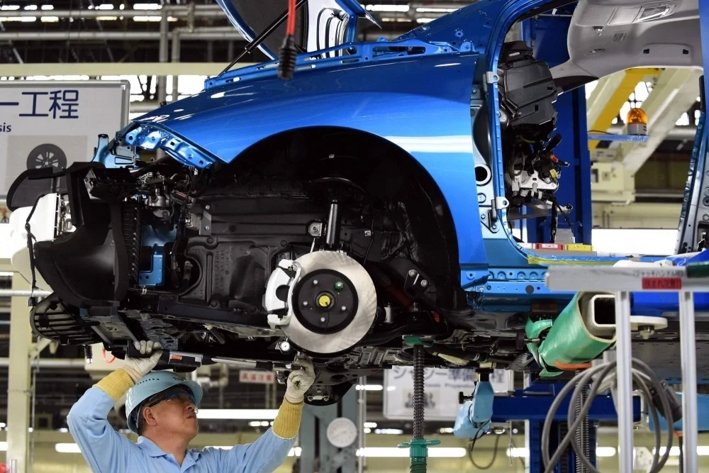 Công nhân trong một nhà máy của Toyota tại thành phố Toyota, tỉnh Aichi. Ảnh: AFP
